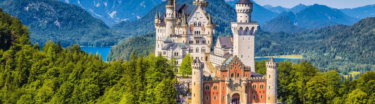 Famous Neuschwanstein Castle with scenic mountain landscape near