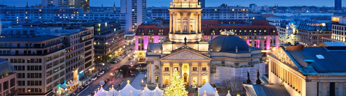 Aerial_view_onto_Christmas_market_at_Gendarmenmarkt-square_in_Berlin_iStock-504384970_1920x1280